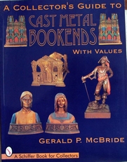 Cast metal bookends ,collectors guide with values.