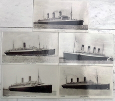 5 photographs of steamships. 